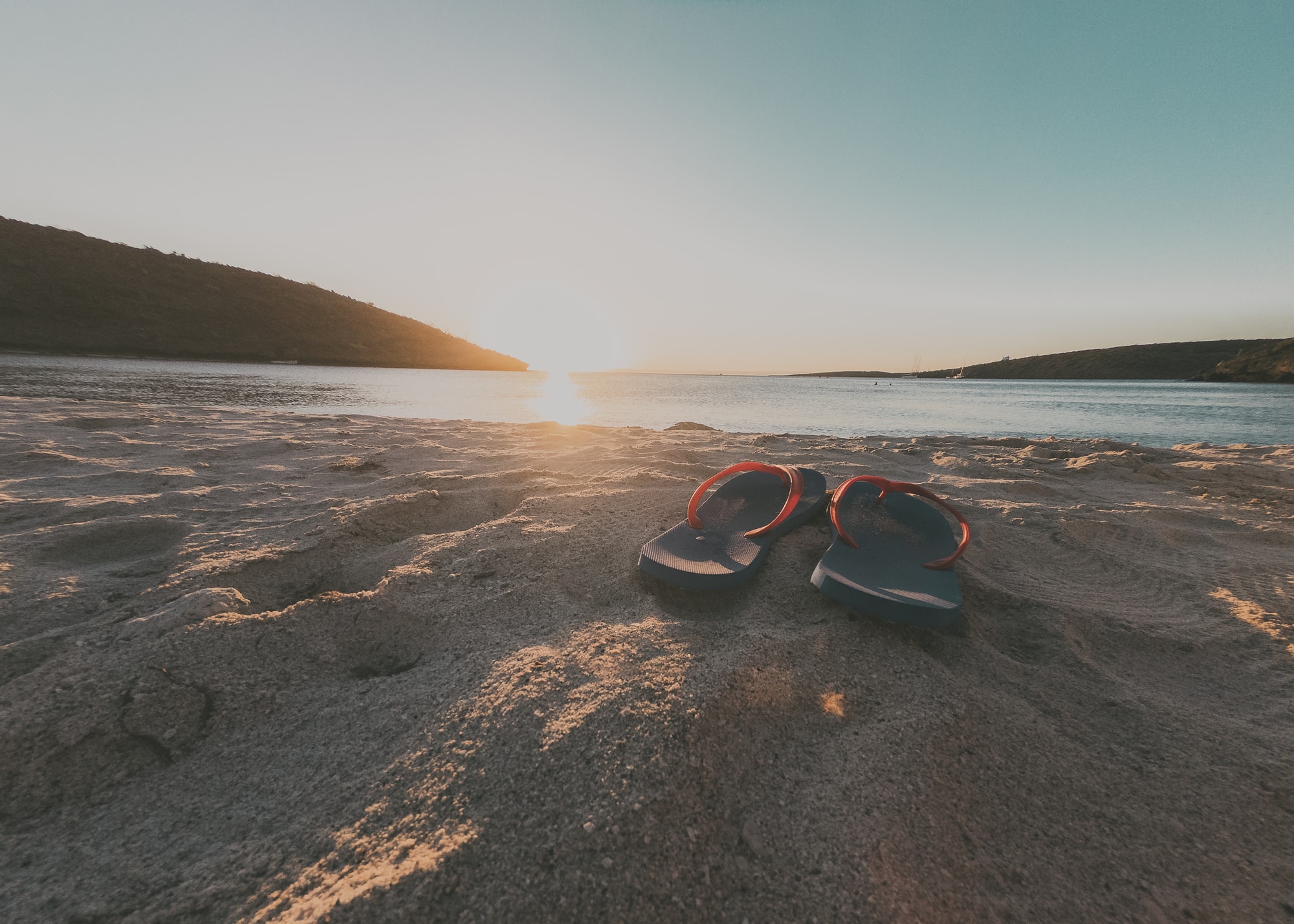 Flip flops on a beach